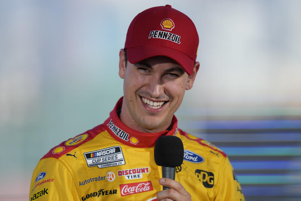 NASCAR Cup Series driver Joey Logano (22) speaks to reporters ahead of practice sessions before a NASCAR exhibition auto race at Los Angeles Memorial Coliseum, Saturday, Feb. 4, 2023, in Los Angeles. (AP Photo/Ashley Landis)