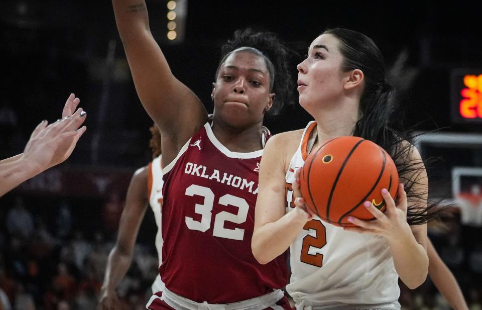 Texas guard Shaylee Gonzales drives to the basket against Oklahoma forward Sahara Williams in the second half Jan. 24 at Moody Center. The Sooners swept the Longhorns in this year's two Big 12 matchups.