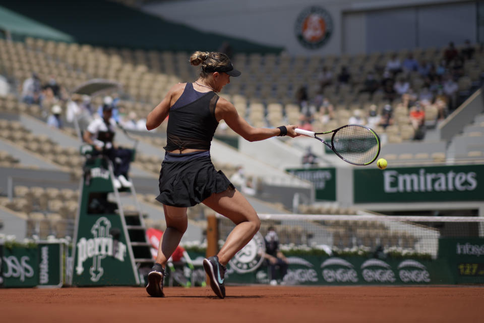 Spain's Paula Badosa returns the ball to Slovenia's Tamara Zidansek during their quarterfinal match of the French Open tennis tournament at the Roland Garros stadium Tuesday, June 8, 2021 in Paris. (AP Photo/Christophe Ena)