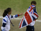 Silver medallists Andy Murray and Laura Robson of Britain play with a flag during the presentation ceremony for tennis mixed doubles at the All England Lawn Tennis Club during the London 2012 Olympic Games August 5, 2012. REUTERS/Adrees Latif (BRITAIN - Tags: OLYMPICS SPORT TENNIS) 