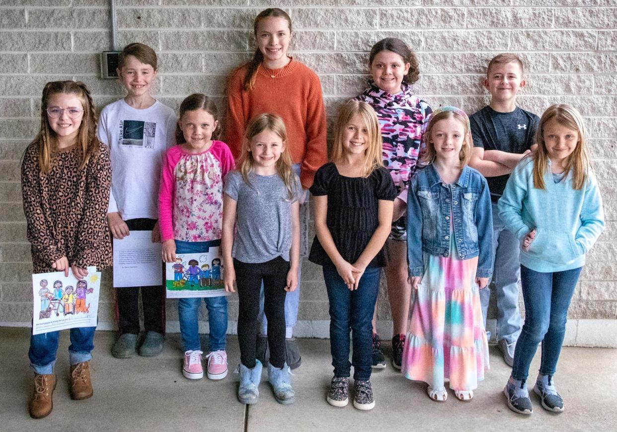 Elementary students in kindergarten to second grade competed in a coloring contest and those in third to sixth grade were in an essay contest from the Coshocton County Board of Developmental Disabilities for DD Awareness Month in March. Winner in the back row are Warren Hartmeyer, Bo Olinger, Auybree Hittle and Mason Addy. In the front row are Rayanne Bradford, Avery Simmons, Kobie McKee, Harper Smith, Harper Seibert and Adalynn Gerthing.