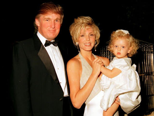 <p>Davidoff Studios Photography/Getty</p> Donald Trump, Marla Maples, and their daughter, Tiffany, during the official opening party of the Mar-a-Lago Club on April 22, 1995.