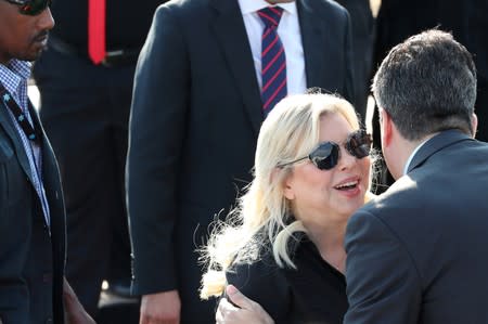 Israeli Prime Minister Benjamin Netanyahu's wife, Sara, attends a ceremony to unveil a sign for a new community named after U.S. President Donald Trump, in the Israeli-occupied Golan Heights