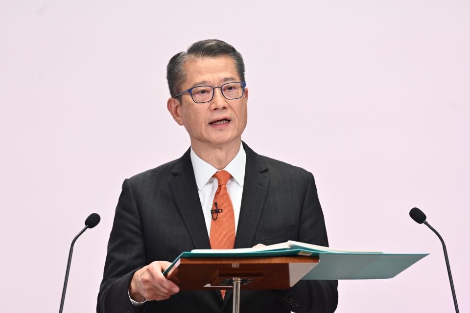 Paul Chan, financial secretary of the Hong Kong Special Administrative Region HKSAR government, delivers the 2022-23 budget speech in Hong Kong, south China, Feb. 23, 2022. TO GO WITH: