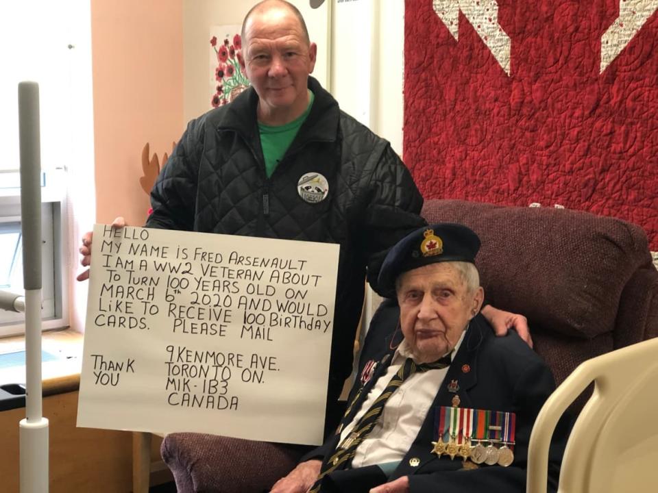 Joseph Alfred 'Fred' Arsenault, born on March 6, 1920 in Prince Edward Island, died on the weekend. He is pictured here with his request for 100 cards for his 100th birthday. Arsenault served during the Second World War. (Grant Linton/CBC - image credit)
