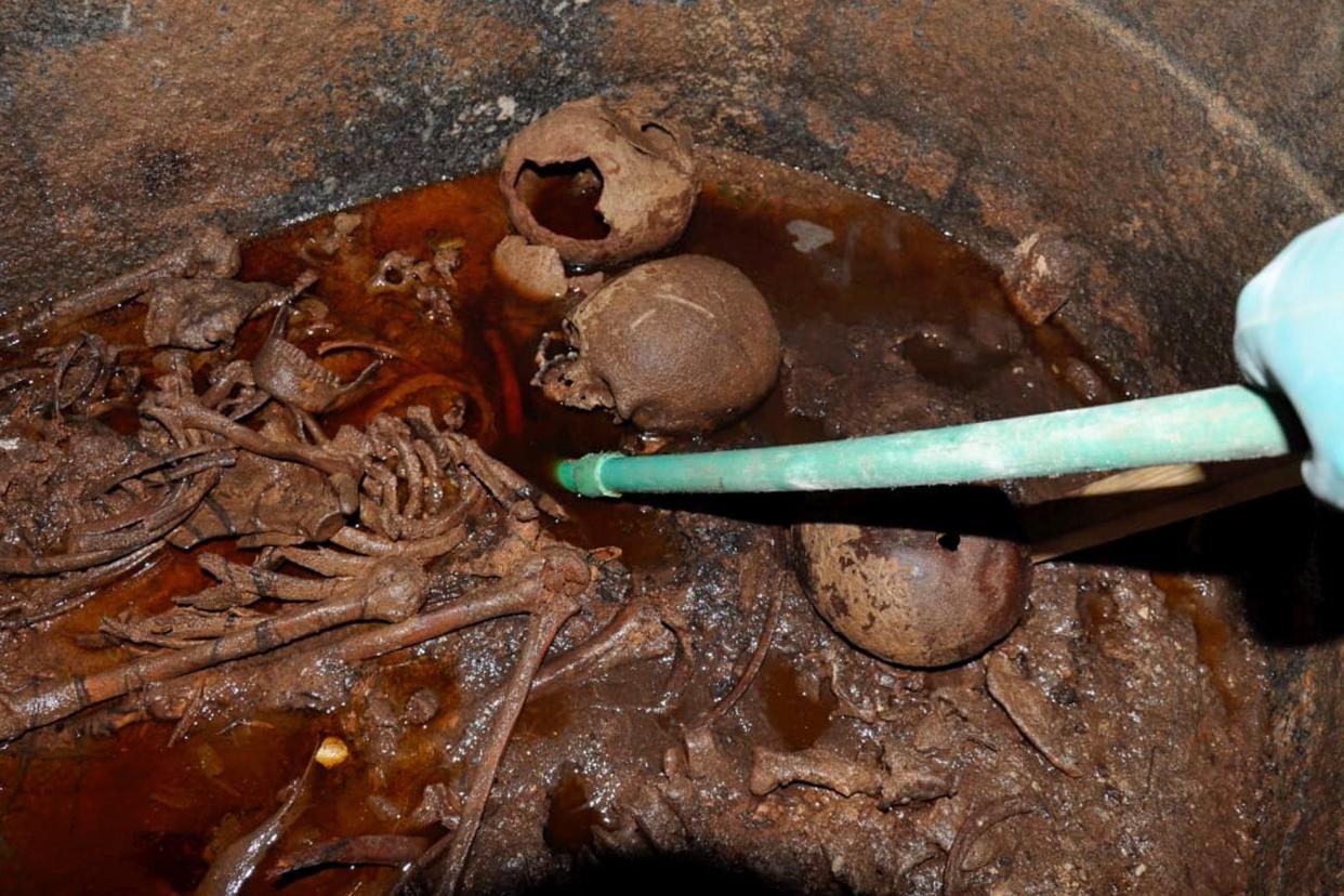 Archaeologists discovered three decomposed mummies after opening the black granite sarcophagus: EPA