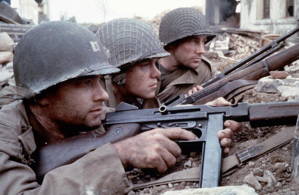 FILE--The Army is hiring Hollywood special effects experts and film makers to create computerized training simulations that will seem so real that soldiers start to sweat, in a program announced Wednesday, Aug. 18, 1999. This scene from the 1998 World War II action drama, "Saving Private Ryan, " shows from left, Tom Hanks as Captain Miller, Matt Damon as Private Ryan and Edward Burns as Private Reiben.  (AP Photo/File)