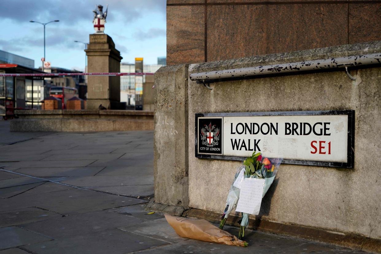 <p>A floral tribute near the scene of last year’s terror attack</p> (AFP via Getty Images)