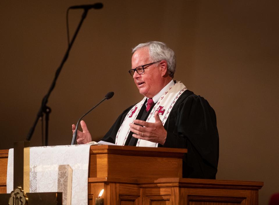 Rev. David McEntire, Senior Pastor at First Methodist Church in Lakeland, speaks during the funeral service for C.C. "Doc" Dockery in August. McEntire is retiring after 15 years with the church.