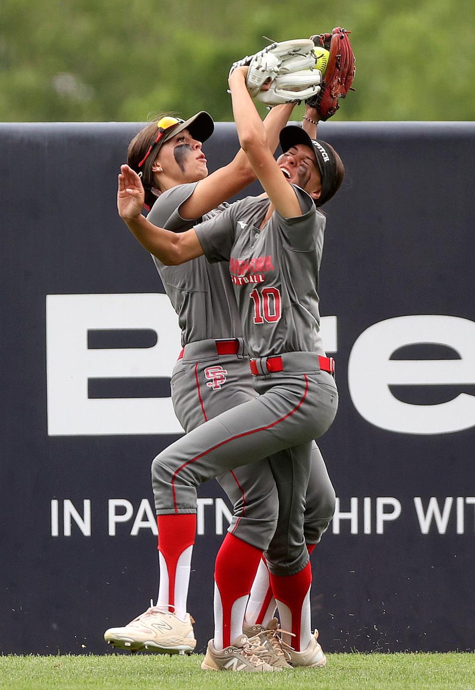 Spanish Fork’s Ellie Olson and Lia Higginson collide while reaching for a catch during the 5A softball championship game against Bountiful at the Miller Park Complex in Provo on Friday, May 26, 2023. Spanish Fork won 8-4. | Kristin Murphy, Deseret News