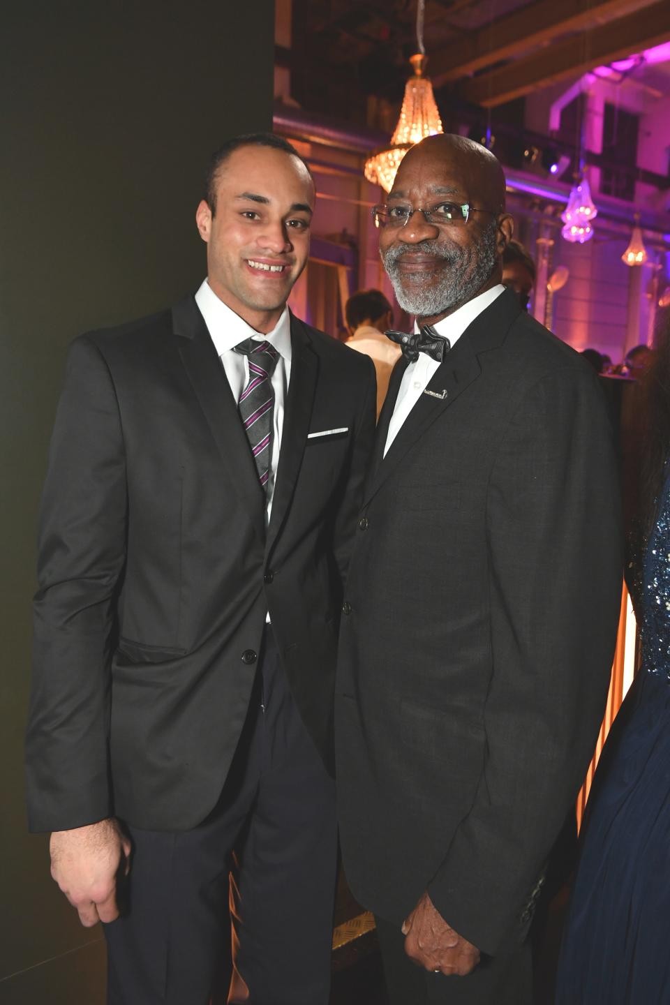 Edwin Moses and son Edwin Julian Moses attend the 14th Laureus Charity Night at Lichthalle Maag on Nov. 13, 2021 in Zurich, Switzerland. 