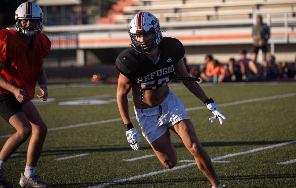 Refugio defensive end Hayden LaFrance slips through the offensive line during practice on Wednesday, Nov. 17, 2021 at the High School.