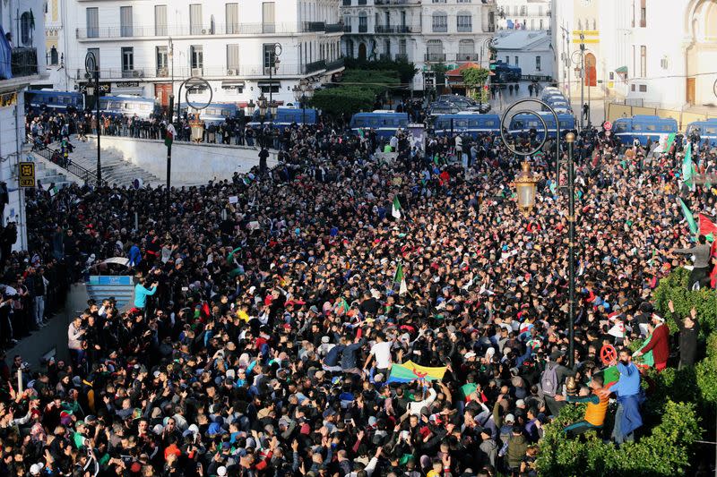 Demonstrators shout slogans during a protest to reject the presidential election in Algiers,