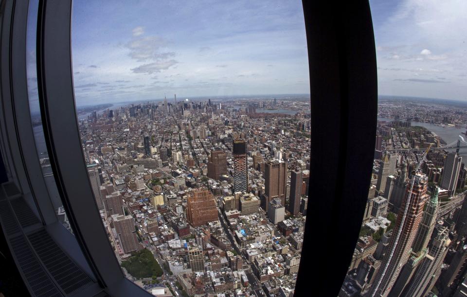 A view of the Manhattan skyline from the One World Observatory observation deck on the 100th floor of the One World Trade center tower in New York during a press tour of the site May 20, 2015. One World Observatory will open to the public on May 29. (REUTERS/Mike Segar)