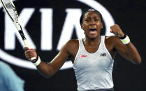 United States' Cori "Coco" Gauff reacts during her first round singles match against compatriot Venus Williams at the Australian Open tennis championship in Melbourne, Australia, Monday, Jan. 20, 2020. (AP Photo/Dita Alangkara)