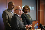 Minneapolis residents Don and Sondra Samuels listen as their attorney Joe Anthony speaks at a press conference to discuss where the situation stands regarding language on the future of the Minneapolis policing ballot Wednesday, Sept. 15, 2021, in Minneapolis. A judge struck down ballot language last week that aimed to replace the Minneapolis Police Department with a new agency, which sent the City Council scrambling to approve new language that members hope will stand up. The injunction to keep the language off the ballot was sought by former City Council Member Samuels, his wife, and businessman Bruce Dachis. (David Joles/Star Tribune via AP)