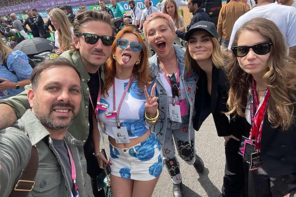 <p>Bella Thorne/Instagram</p> Bella Thorne, Florence Pugh and Cara Delevingne (center) pose with friends at the British Grand Prix