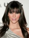 <p>"Should I get bangs?" - That is literally the sentence I hear as soon as I look at this picture of Kim from back in 2008. </p><p>Still rocking her signature smokey eye, which is only enhanced by her lash-skimming fringe</p>