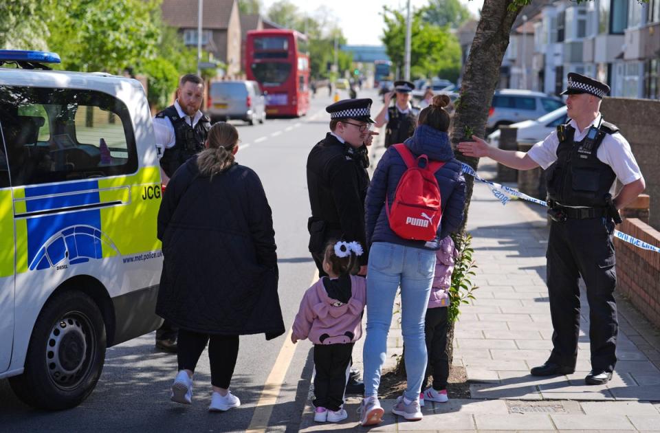 Police is talking to the public at the scene in Hainault (Jordan Pettitt/PA Wire)