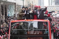 <p>The fearsome four: From left, Sebastian Giovinco, Victor Vasquez, Jozy Altidore and Michael Bradley hold the MLS Cup aloft during Monday’s bus parade. </p>