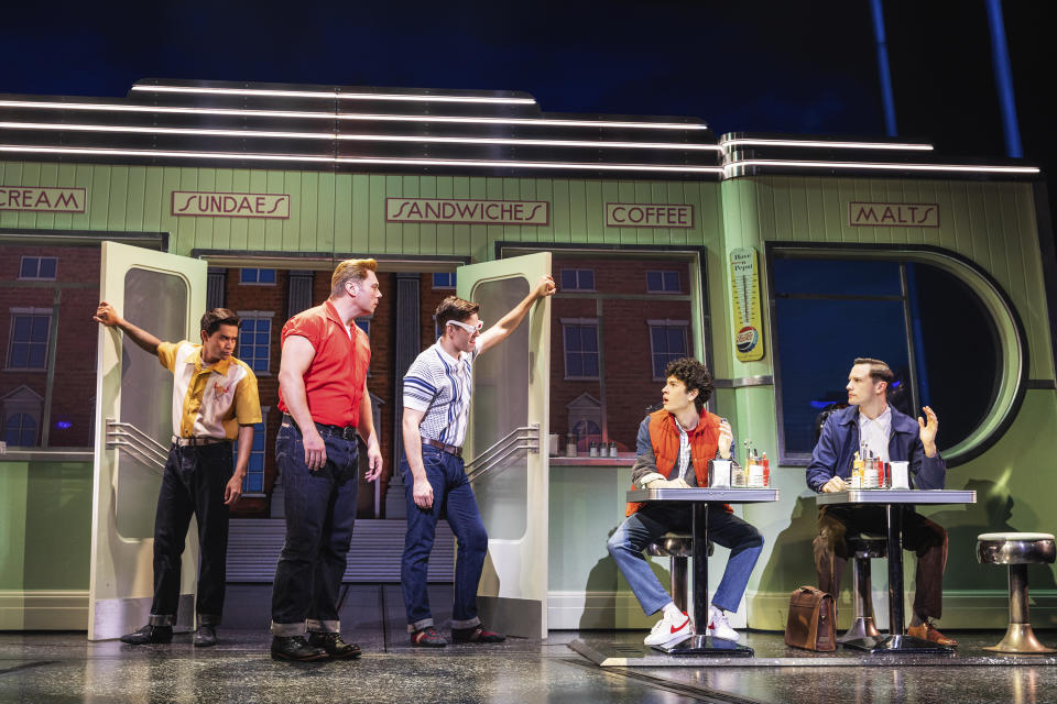 This image released by Polk & Co. shows Daryl Tofa, from left, Nathaniel Hackmann, Will Branner, Casey Likes and Hugh Coles during a performance of "Back to the Future: The Musical." (Matthew Murphy and Evan Zimmerman via AP)