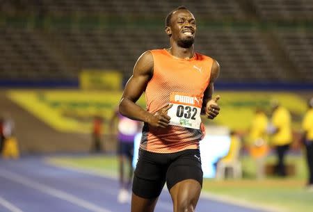 FILE PHOTO - Athletics - Jamaica National Trials - Kingston - 30/06/16 Winner Usain Bolt of Jamaica upset after his quarter final 100m race. REUTERS/Gilbert Bellamy /File Photo