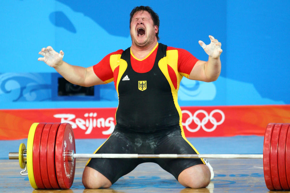 BEIJING - AUGUST 19: Matthias Steiner of Germany celebrates winning the gold medal in the Men's 105 kg group weightlifting event at the Beijing University of Aeronautics & Astronautics Gymnasium on Day 11 of the Beijing 2008 Olympic Games on August 19, 2008 in Beijing, China. (Photo by Julian Finney/Getty Images)