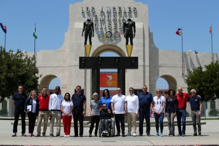 International Olympic Committee Evaluation Commission and LA 2024 members pose for a picture in front of Los Angles Memorial Coliseum after touring the facility in Los Angeles, California, U.S., May 11, 2017. REUTERS/Mike Blake