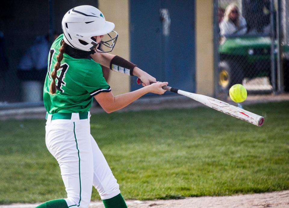 Yorktown's Lexy Morris hits against Delta during their game at Delta High School Friday, April 23, 2021. 