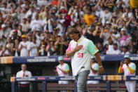 San Diego Padres former pitcher Trevor Hoffman greets fans before throwing out the ceremonial first pitch at the start of an MLB baseball game between the San Francisco Giants and San Diego Padres, at the Alfredo Harp Helu Stadium in Mexico City, Saturday, April 29, 2023. (AP Photo/Fernando Llano)