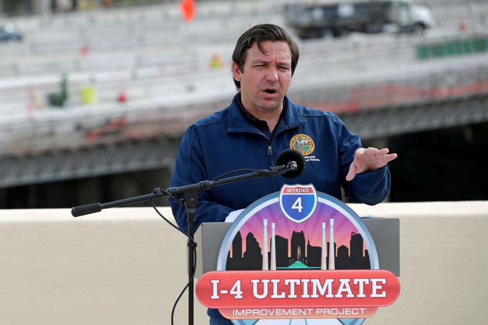 Florida Gov. Ron DeSantis speaks at a news conference May 18 in Orlando about plans to reopen the state amid coronavirus.