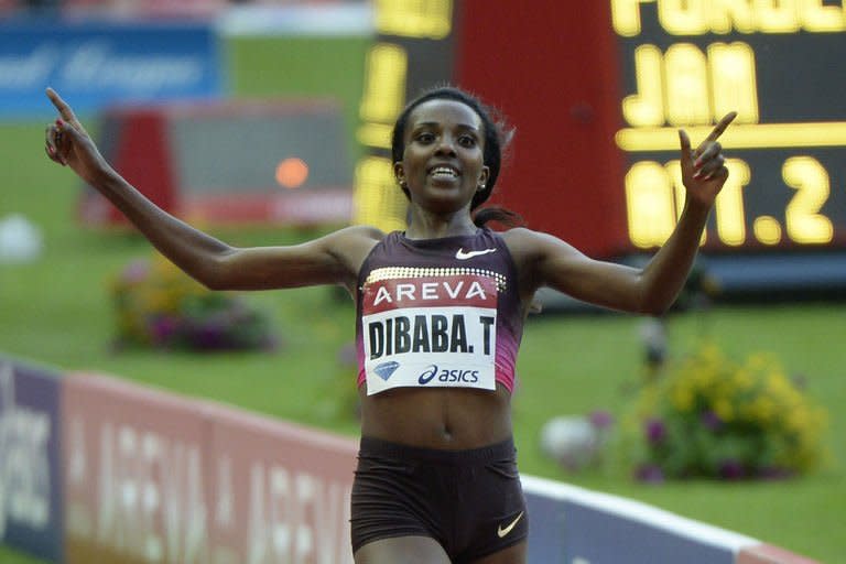 Ethiopia's Tirunesh Dibaba wins the women's 5000m at the IAAF Diamond League athletics meeting in Saint-Denis, near Paris, on July 6, 2013