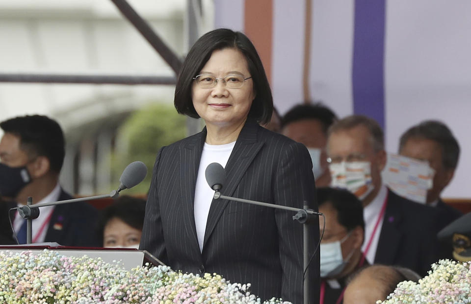 Taiwanese President Tsai Ing-wen delivers a speech during National Day celebrations in front of the Presidential Building in Taipei, Taiwan, Saturday, Oct. 10, 2020. Tsai said Saturday she has hopes for less tensions with China and in the region if Beijing will listen to Taipei’s concerns, alter its approach and restart dialogue with the self-ruled island democracy. (AP Photo/Chiang Ying-ying)