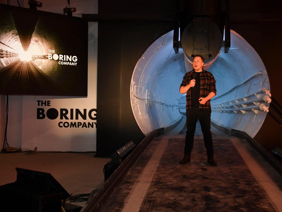 Elon Musk, co-founder and chief executive officer of Tesla Inc., speaks during an unveiling event for the Boring Company Hawthorne test tunnel in Hawthorne, south of Los Angeles, California on December 18, 2018