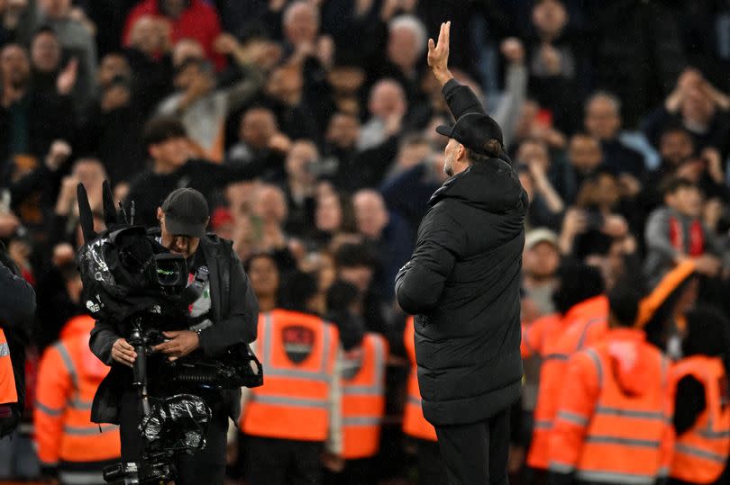 Jürgen Klopp salutes the Liverpool fans at Villa Park.