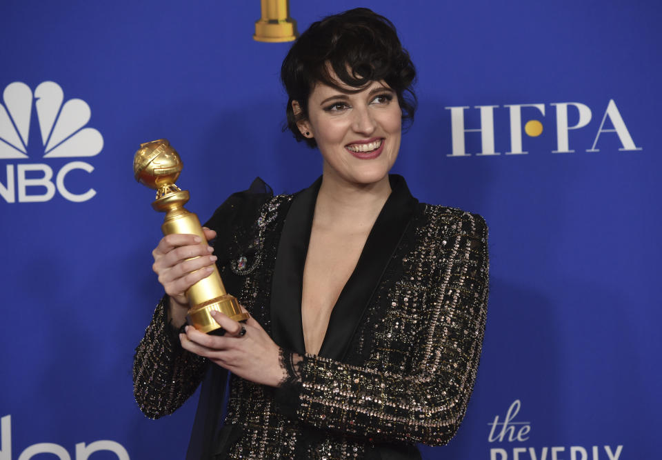 Phoebe Waller-Bridge poses in the press room with the award for best performance by an actress in a television series, musical or comedy, for "Fleabag" at the 77th annual Golden Globe Awards at the Beverly Hilton Hotel on Sunday, Jan. 5, 2020, in Beverly Hills, Calif. (AP Photo/Chris Pizzello)