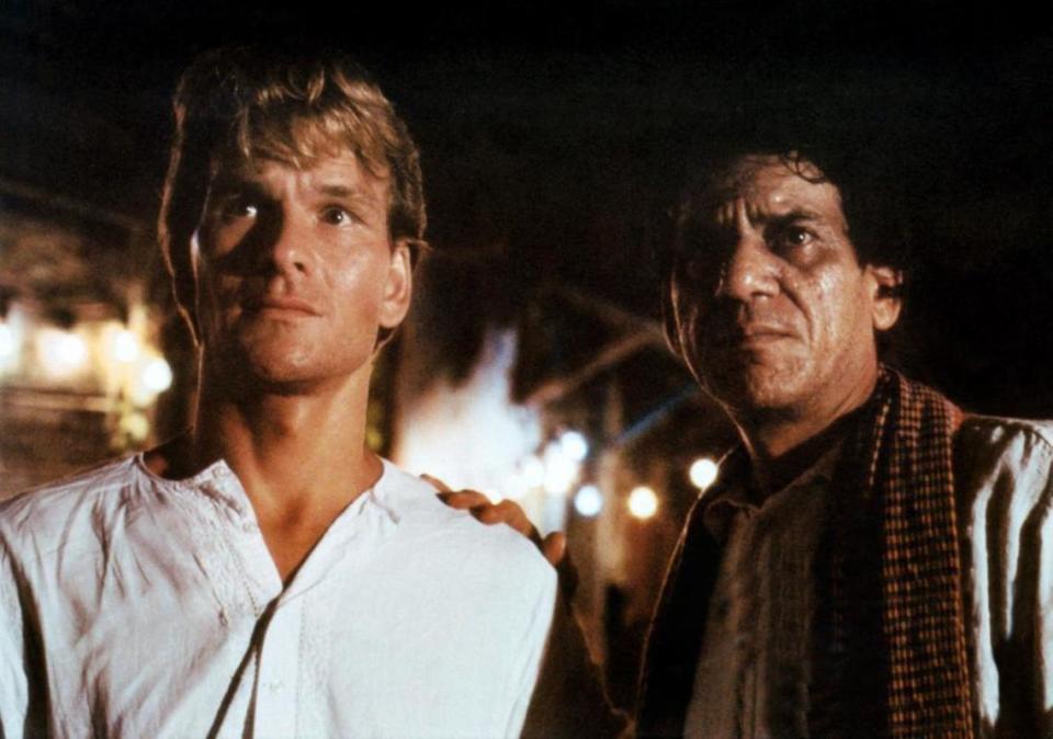 Patrick Swayze and Art Malik in "City of Joy" (1992)<p>Warner Bros.</p>