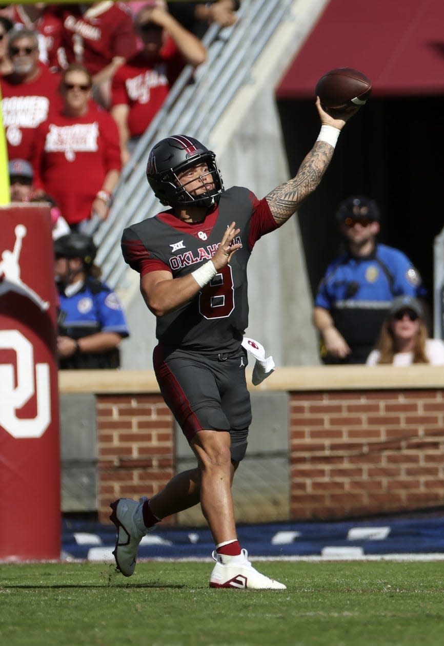 Oct 15, 2022; Norman, Oklahoma, USA;  Oklahoma Sooners quarterback Dillon Gabriel (8) throws during the first half against the Kansas Jayhawks at Gaylord Family-Oklahoma Memorial Stadium. Mandatory Credit: Kevin Jairaj-USA TODAY Sports