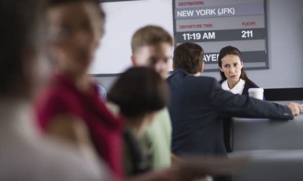 Upset passenger in line at airport