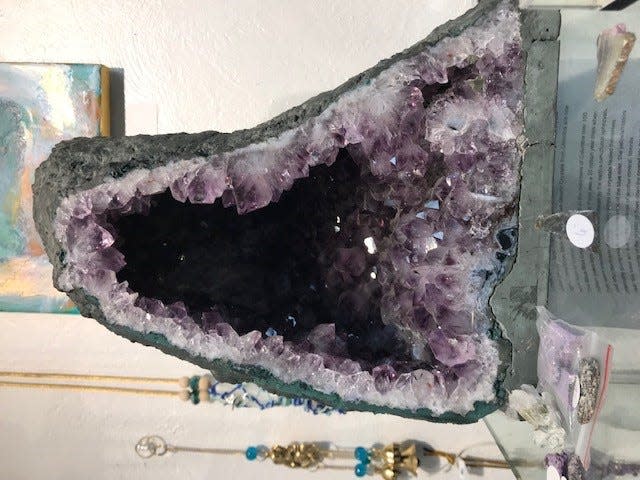 A purple amethyst crystal.