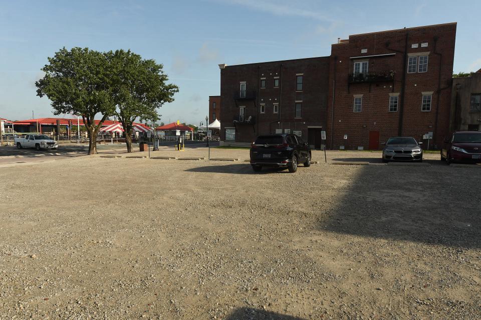 Parking area at 115 S Water Street Monday June 13,  2022 in downtown Wilmington, N.C. The Wilmington Historic Preservation Commission will consider plans for a 6-story mixed-use project along Water Street. The lot has seen several past development attempts. KEN BLEVINS/STARNEWS