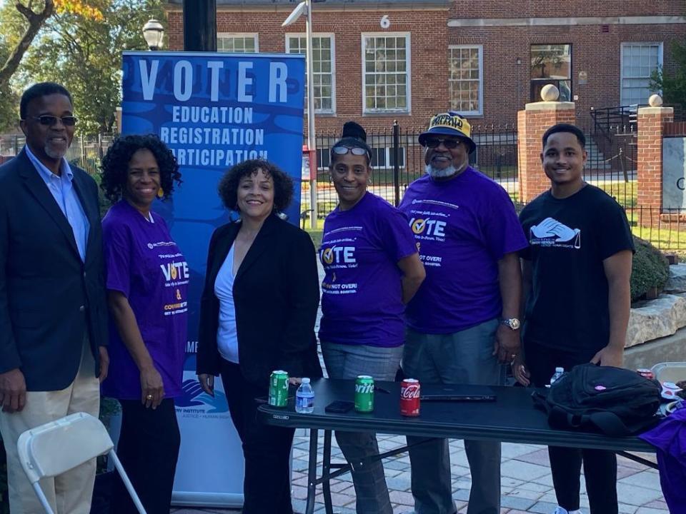 From left, Rev. Dr. Gregory Eason, First Lady Linda Eason, Cheryl Lowery, Deitra Johnson, Sgt. James Hall and a student from Clark Atlanta University at a student voter registration event in Atlanta.