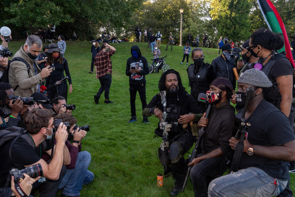 <strong>Portland, Ore., Sept. 26, 2020.</strong> "Militia members pose for the media at a Black Lives Matter protest. On the same day, in a nearby park, a Black Lives Matter rally dissolved into infighting. The situation was deescalated by this Black militia, which posed for photos."<span class="copyright">Peter van Agtmael—Magnum Photos for TIME</span>