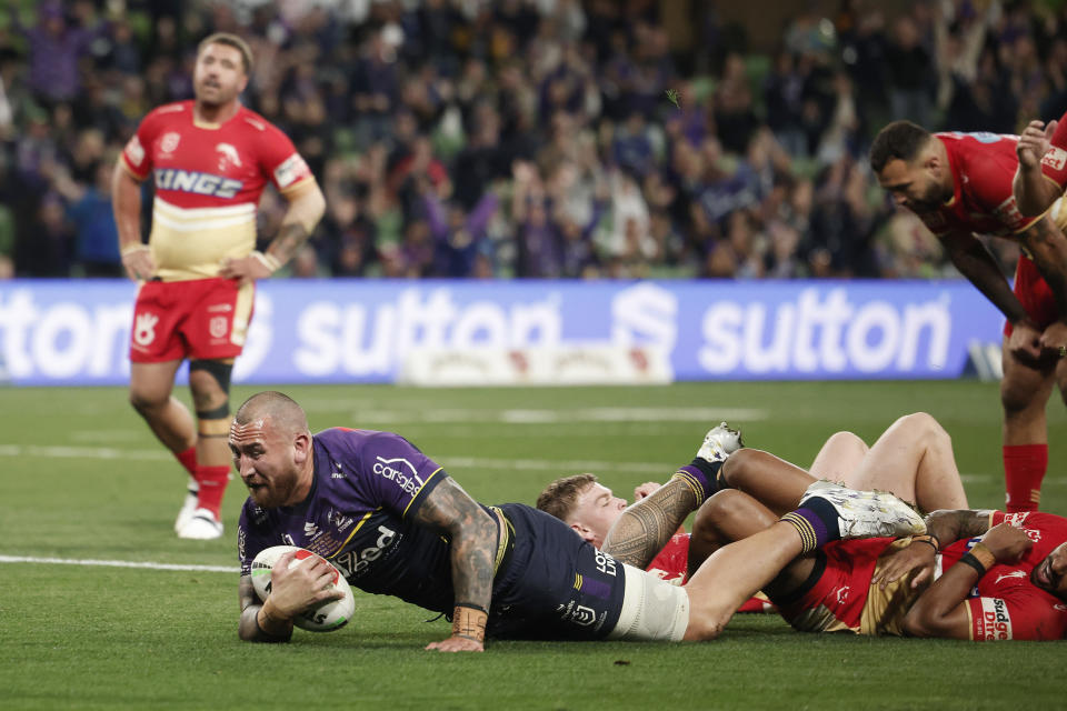 MELBOURNE, AUSTRALIA - AUGUST 24: Nelson Asofa-Solomona of the Storm scores a try during the round 25 NRL match between Melbourne Storm and Dolphins at AAMI Park, on August 24, 2024, in Melbourne, Australia. (Photo by Daniel Pockett/Getty Images)