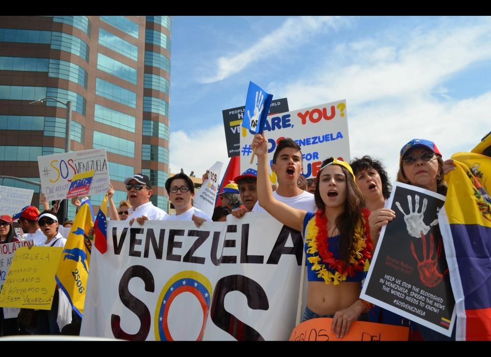 Demonstrators line Wilshire Boulevard in Los Angeles, California in front of the Federal Building.