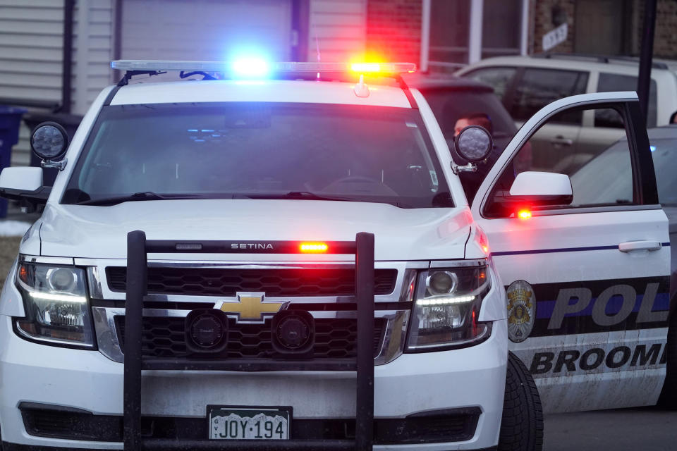 A Broomfield, Colo., Police Department vehicle blocks access to the street on which a home was peppered by parts from a plane as it was making an emergency landing at nearby Denver International Airport Saturday, Feb. 20, 2021, in Broomfield, Colo. (AP Photo/David Zalubowski)