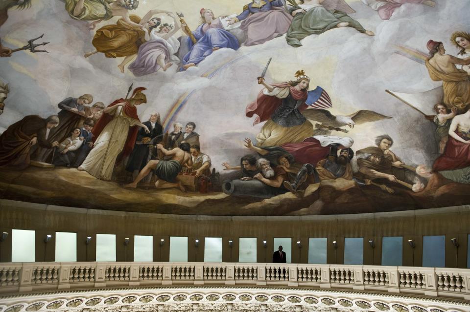 Constantino Brumidi's painting "The Apotheosis of Washington" is shown on the "eye" or ceiling of the U.S. Capitol's rotunda during a media tour of the capitol dome on Capitol Hill in Washington, December 19, 2013. Americans longing for a makeover in Washington will get their wish partially granted as the dome of the U.S. Capitol - but not the lawmakers who work inside - undergoes a facelift. The dome of the capitol building will be undergoing a restoration project to halt deterioration of the dome's cast iron as well as ensure the protection of the interior of the dome and rotunda. (REUTERS/Douglas Graham/POOL)