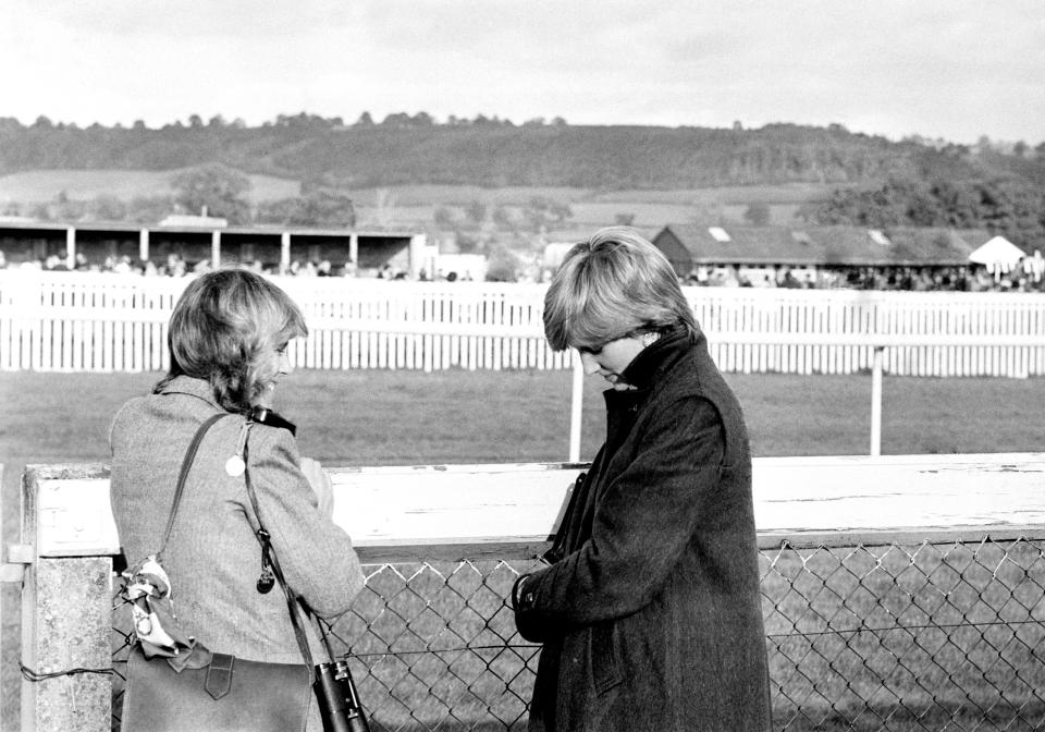 Camilla Parker-Bowles (left) and Lady Diana Spencer (later the Princess of Wales) at Ludlow racecourse to watch the Amateur Riders Handicap Steeplechase in which the Prince was competing.   (Photo by PA Images via Getty Images)