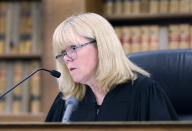 Judge Beverly Cannone listens on day one of the Emanuel Lopes trial for the 2018 murder of Weymouth Police Sgt. Michael Chesna and Vera Adams, in Norfolk Superior Court in Dedham, Mass., Thursday June 8, 2023. (Greg Derr/The Patriot Ledger via AP, Pool)