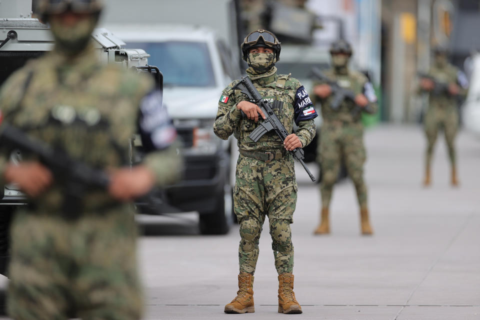 VARIOUS CITIES, MEXICO - SEPTEMBER 16: Mexican Soldiers pose during the Independence Day military parade at Zocalo Square on September 16, 2020 in Various Cities, Mexico. This year El Zocalo remains closed for general public due to coronavirus restrictions. Every September 16 Mexico celebrates the beginning of the revolution uprising of 1810. (Photo by Hector Vivas/Getty Images)